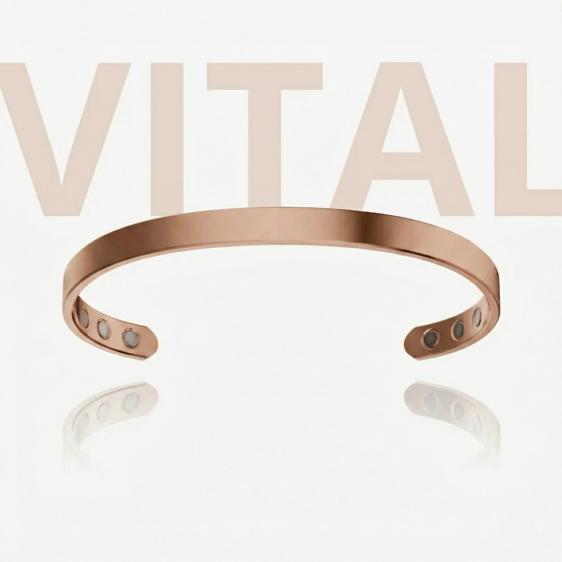 Rose gold bracelet with visible brand name 'Vital' on a light background