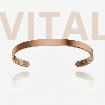 Rose gold bracelet with visible brand name 'Vital' on a light background