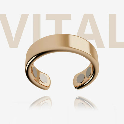 Gold magnetic ring with a reflective surface on a light background