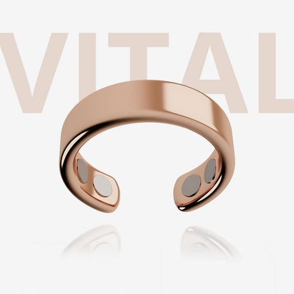 Rose gold magnetic ring on a light background with 'VITAL' text.