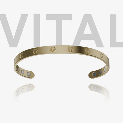 Gold bracelet with small stones on a white background with 'VITAL' text.